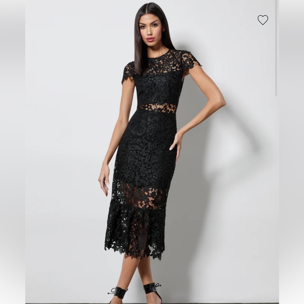 Alice and Olivia dress in black with open back and lace.